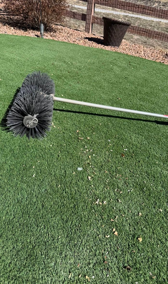 brush sweeping artifical turf in Colorado Springs, CO
